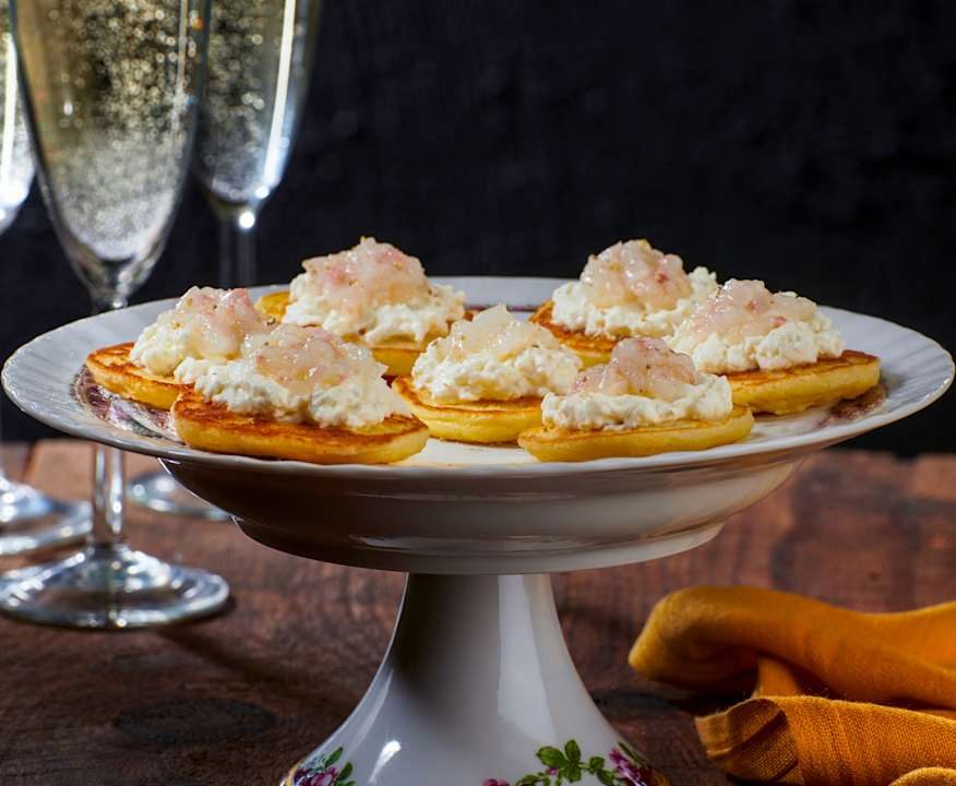 Blinis con burrata e scampi Protein