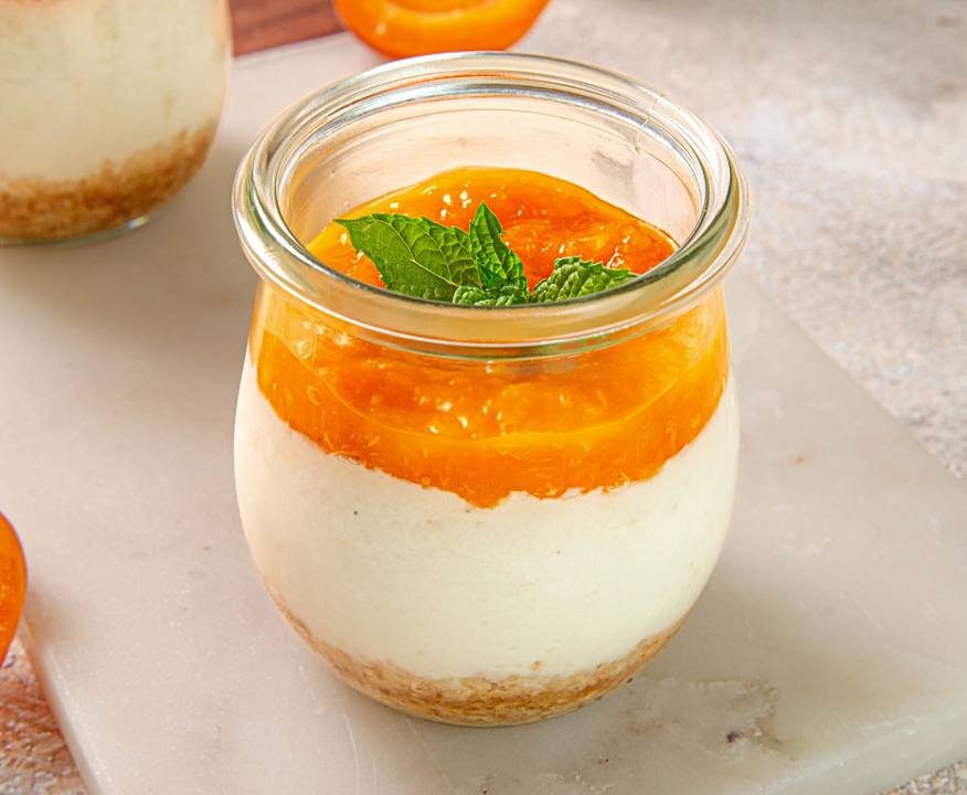 Cheesecake al vapore con coulis di pesche e albicocche (vegan)