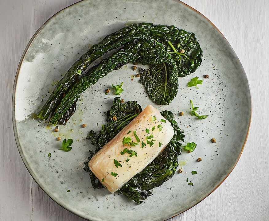 Filetti di merluzzo con contorno di cavolo nero