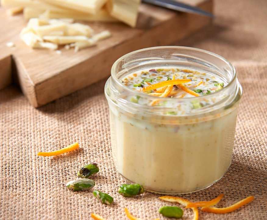 Salsa al cioccolato bianco e pistacchi al profumo di arancia Protein
